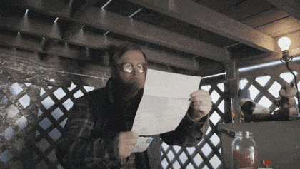 A GIF of a very surprised man.